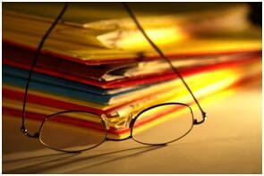 file folders and glasses