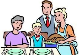 Family gathering around table with roasted turkey.