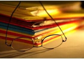 file folders and glasses