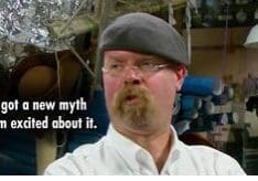 Man in workshop with a gray beret.